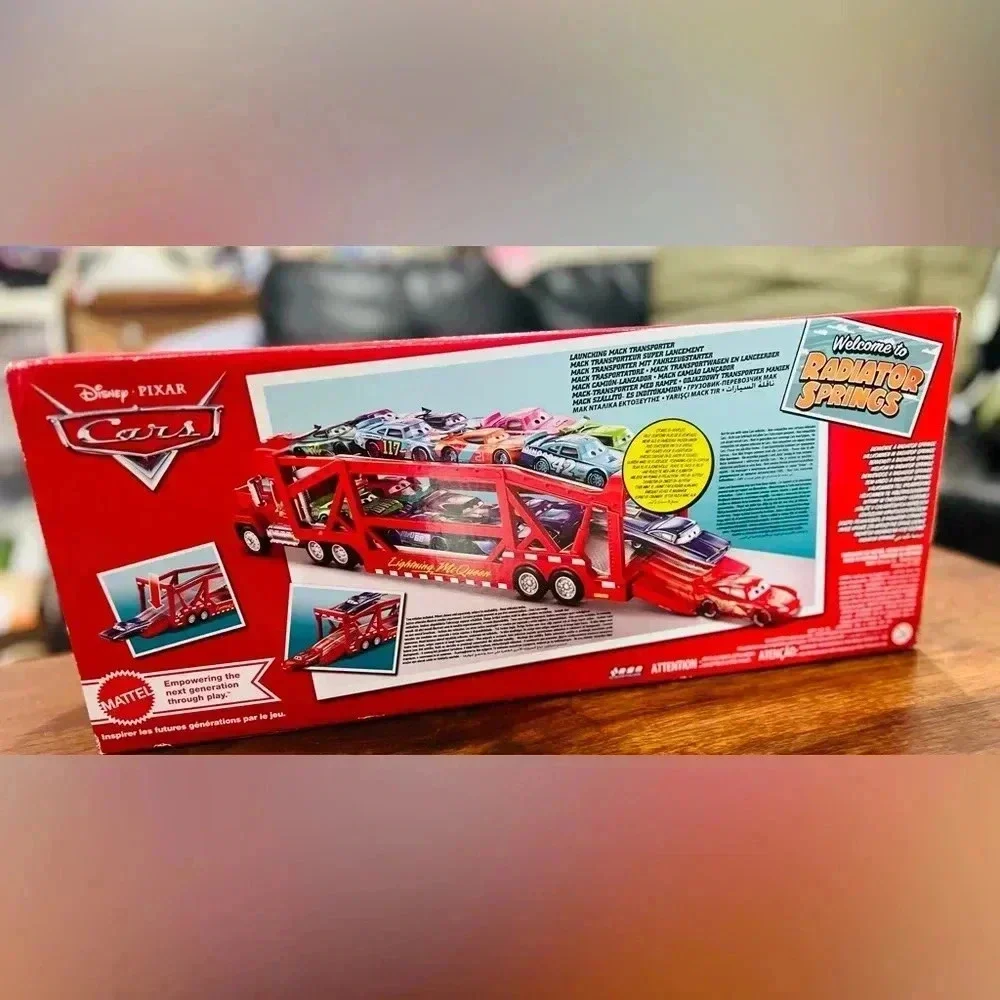 Disney Pixar Cars Launching Mack Transporter Truck Playset - Red Dinoco Transpor